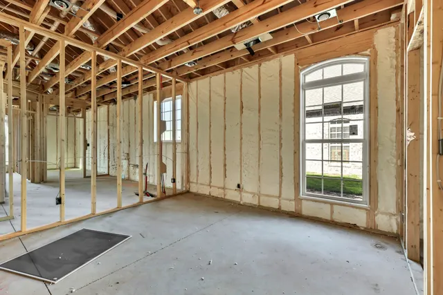 a view of an empty room with a sliding door