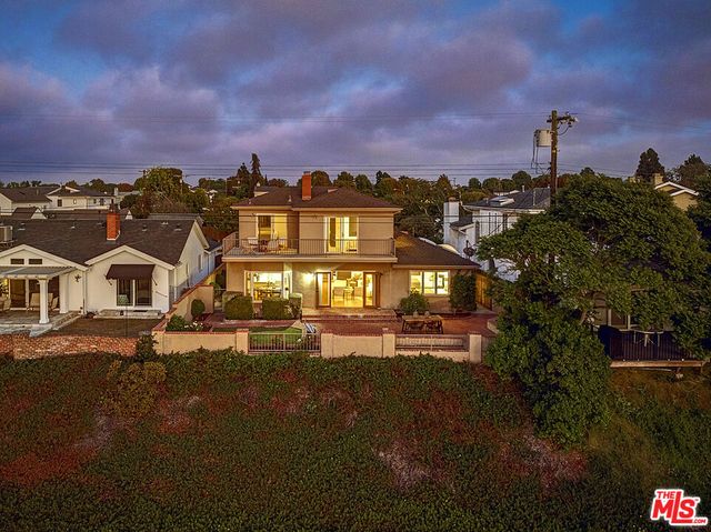a view of a city with a building in the background