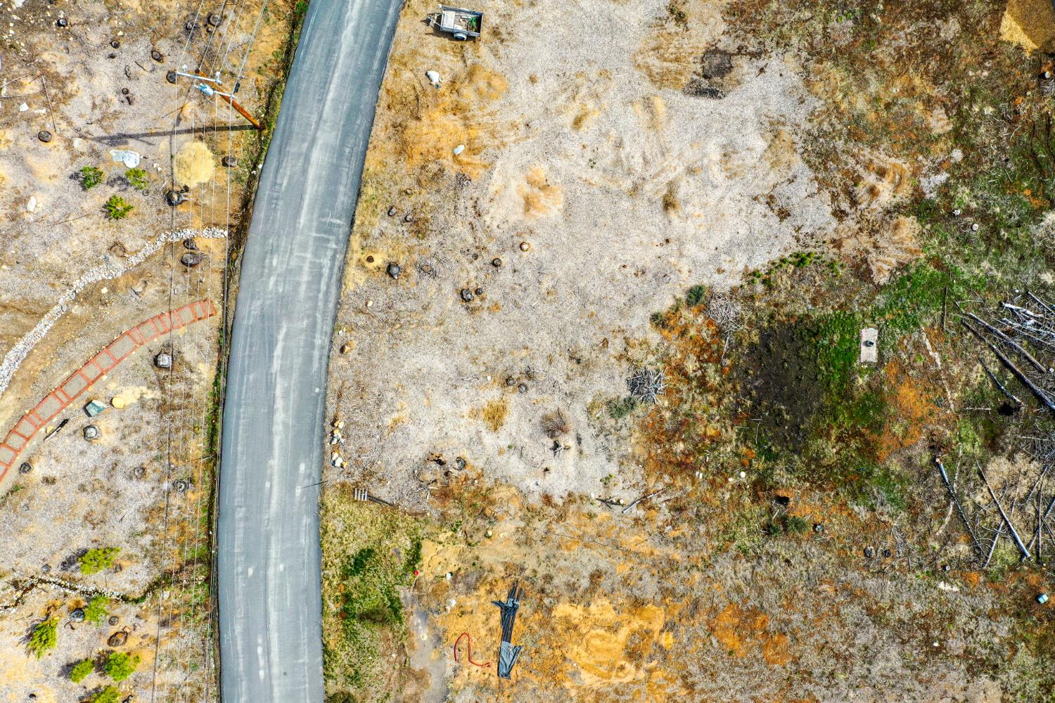 7216 Sierra Pines Road Twin Bridges, CA 95735 - Photo 12 of 16 a bathroom with a shower curtain