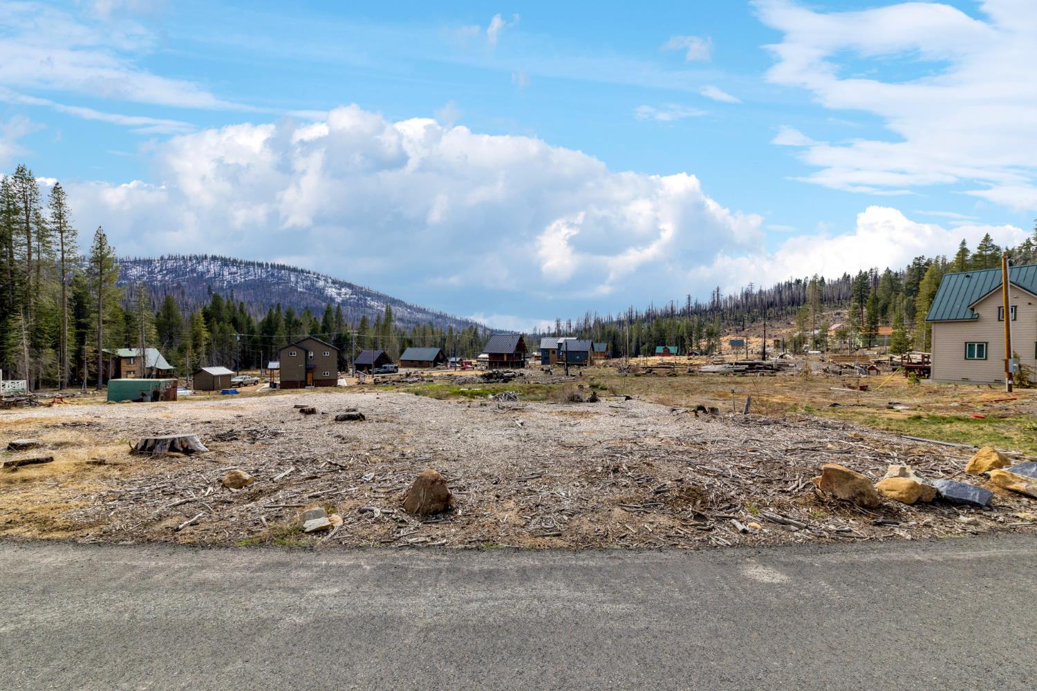 7216 Sierra Pines Road Twin Bridges, CA 95735 - Photo 2 of 16 a view of a road with a houses
