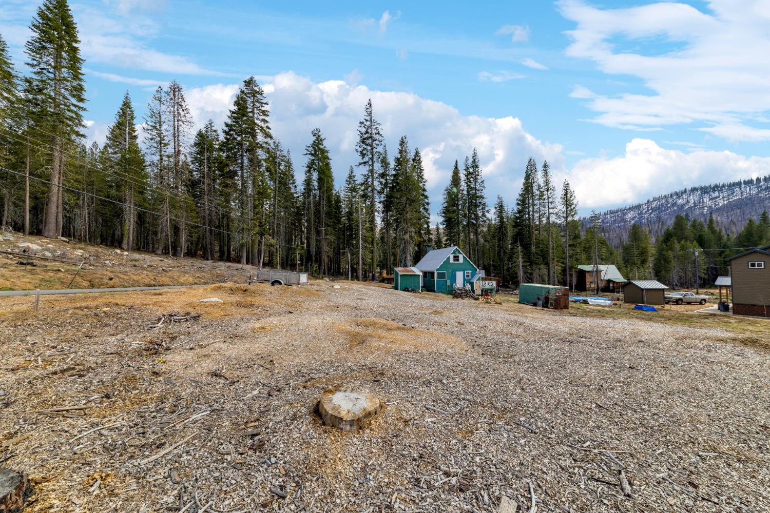 7216 Sierra Pines Road Twin Bridges, CA 95735 - Photo 6 of 16 a view of a road with a building in the background