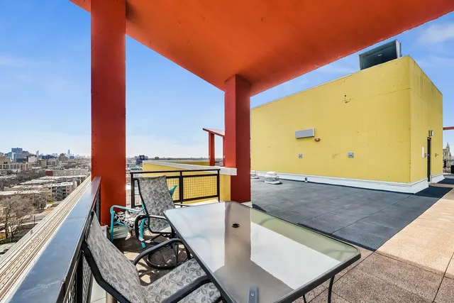 a view of a terrace with chairs