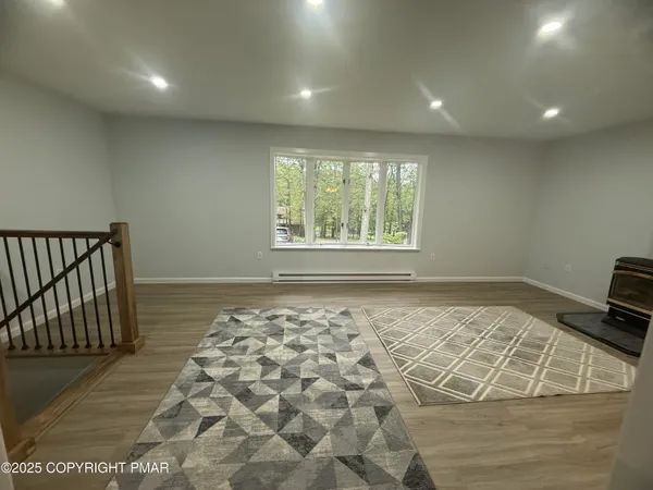 a view of a room with windows