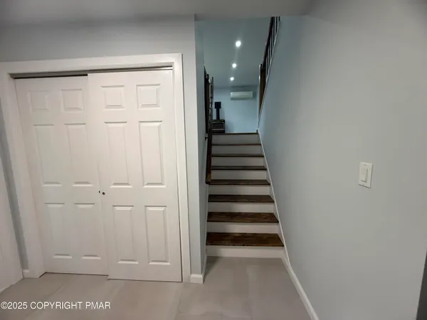 a view of a hallway with entryway