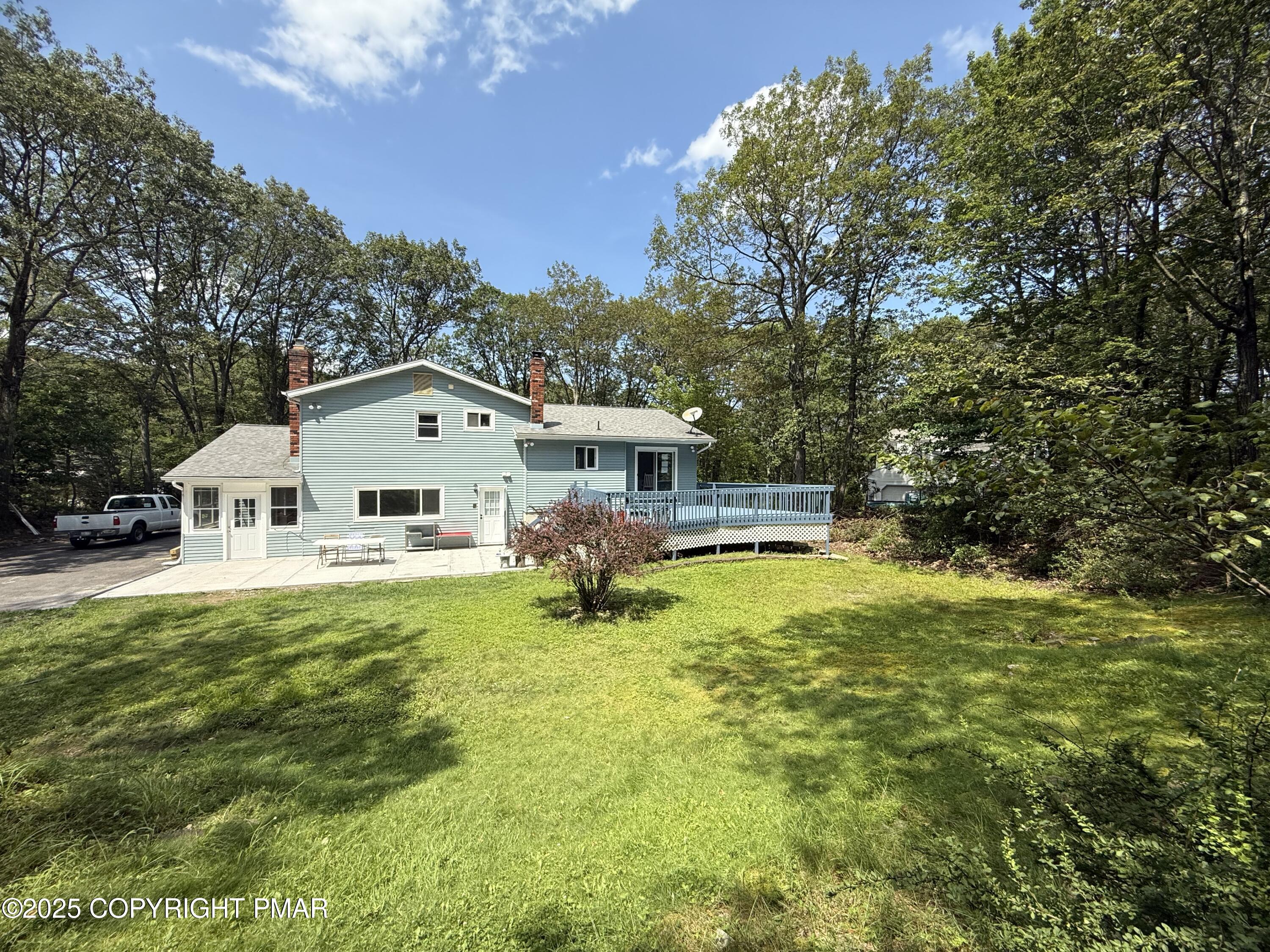 37 Seneca Road Mount Pocono, PA 18344 - Photo 3 of 46 a house view with a outdoor space