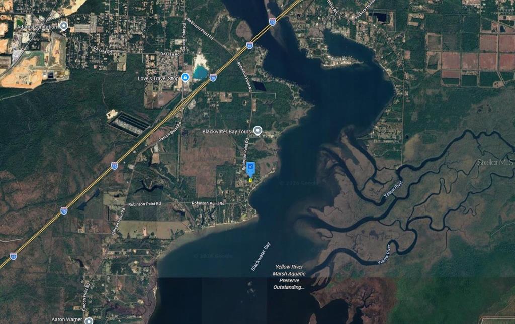 7360 Owensville Road Milton, FL 32583 - Photo 4 of 6 an aerial view of a house