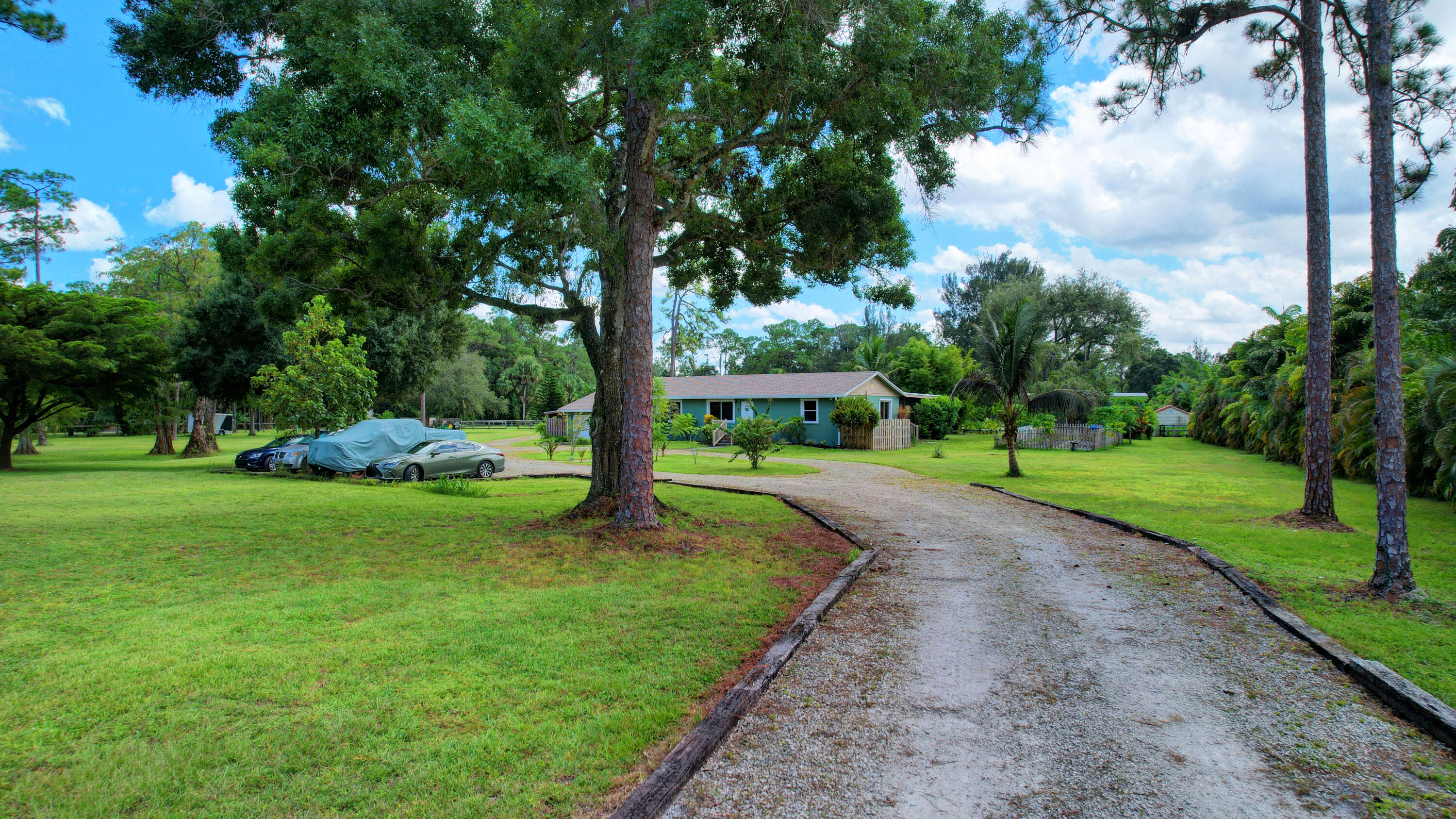 13598 N Road Loxahatchee Groves, FL 33470 - Photo 23 of 87 23_house air (23)