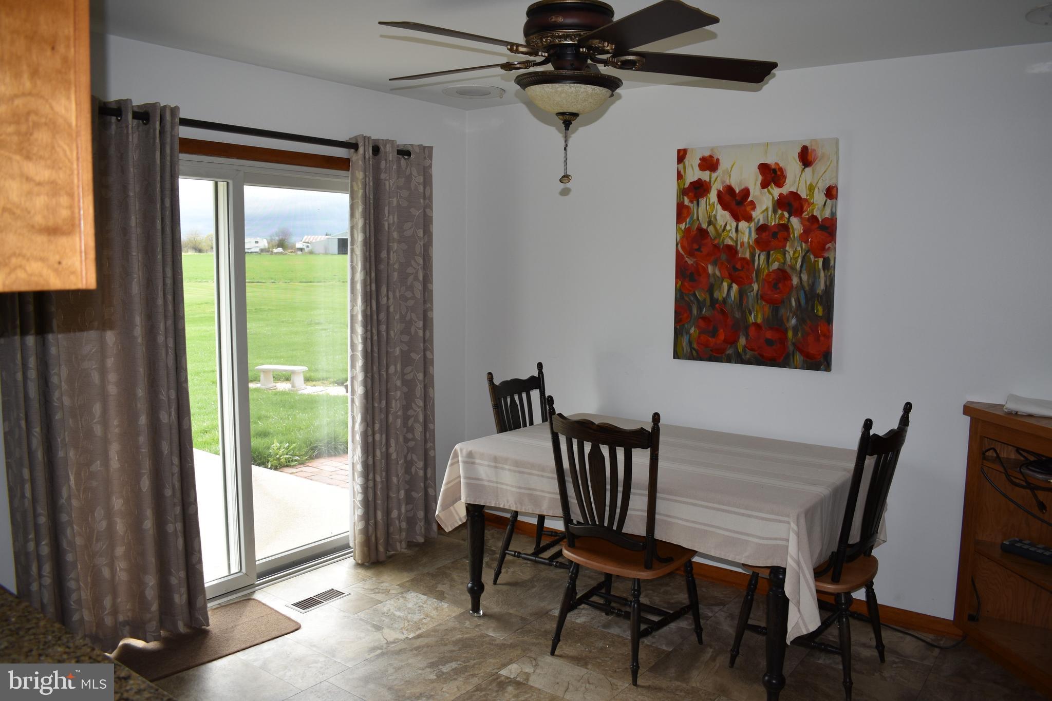5211 Harney Road Taneytown, MD 21787 - Photo 6 of 20 Dining area with sliding door to backyard