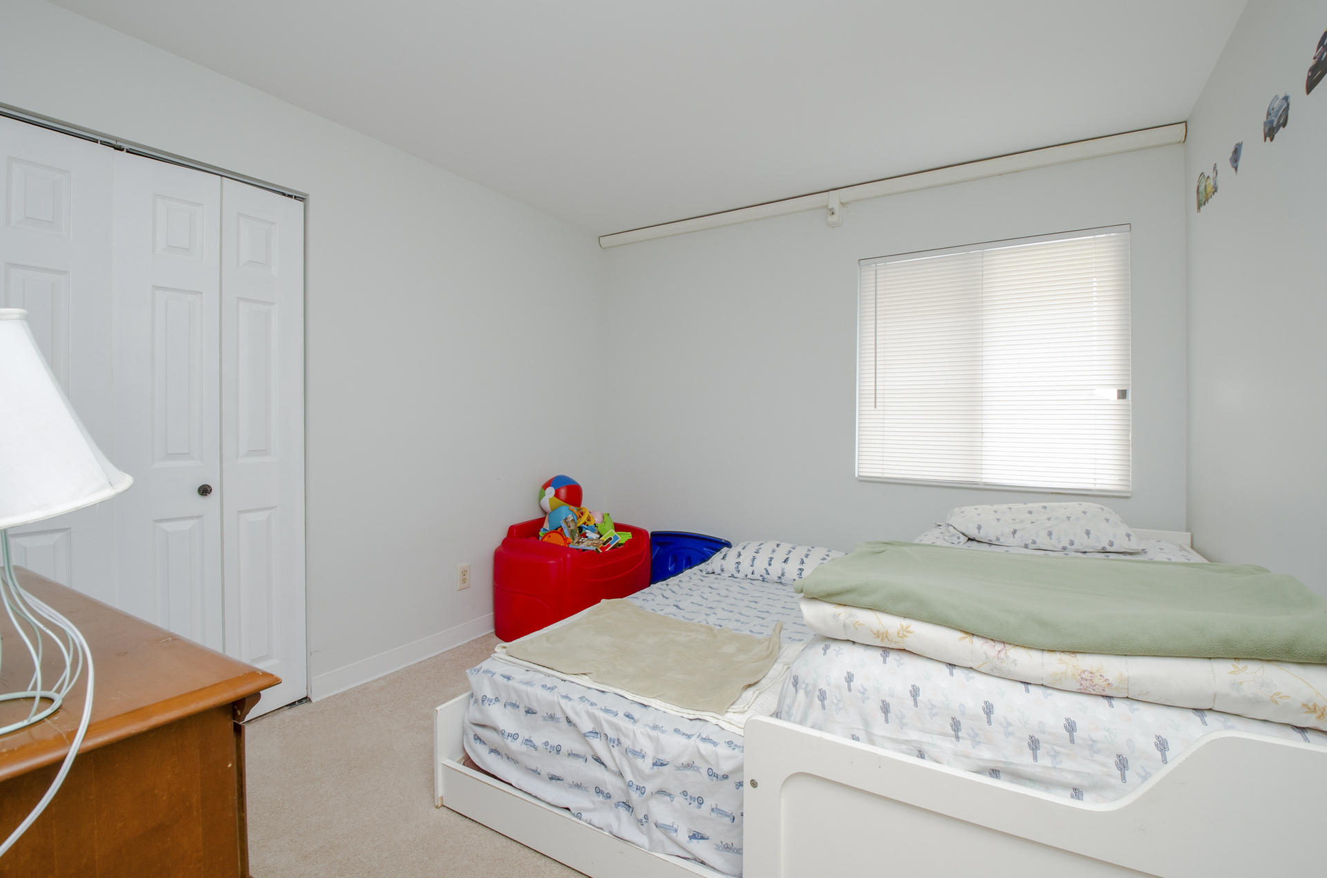 800 Bearses Way, Unit 4EC Hyannis, MA 02601 - Photo 12 of 20 a bedroom with a bed and a window