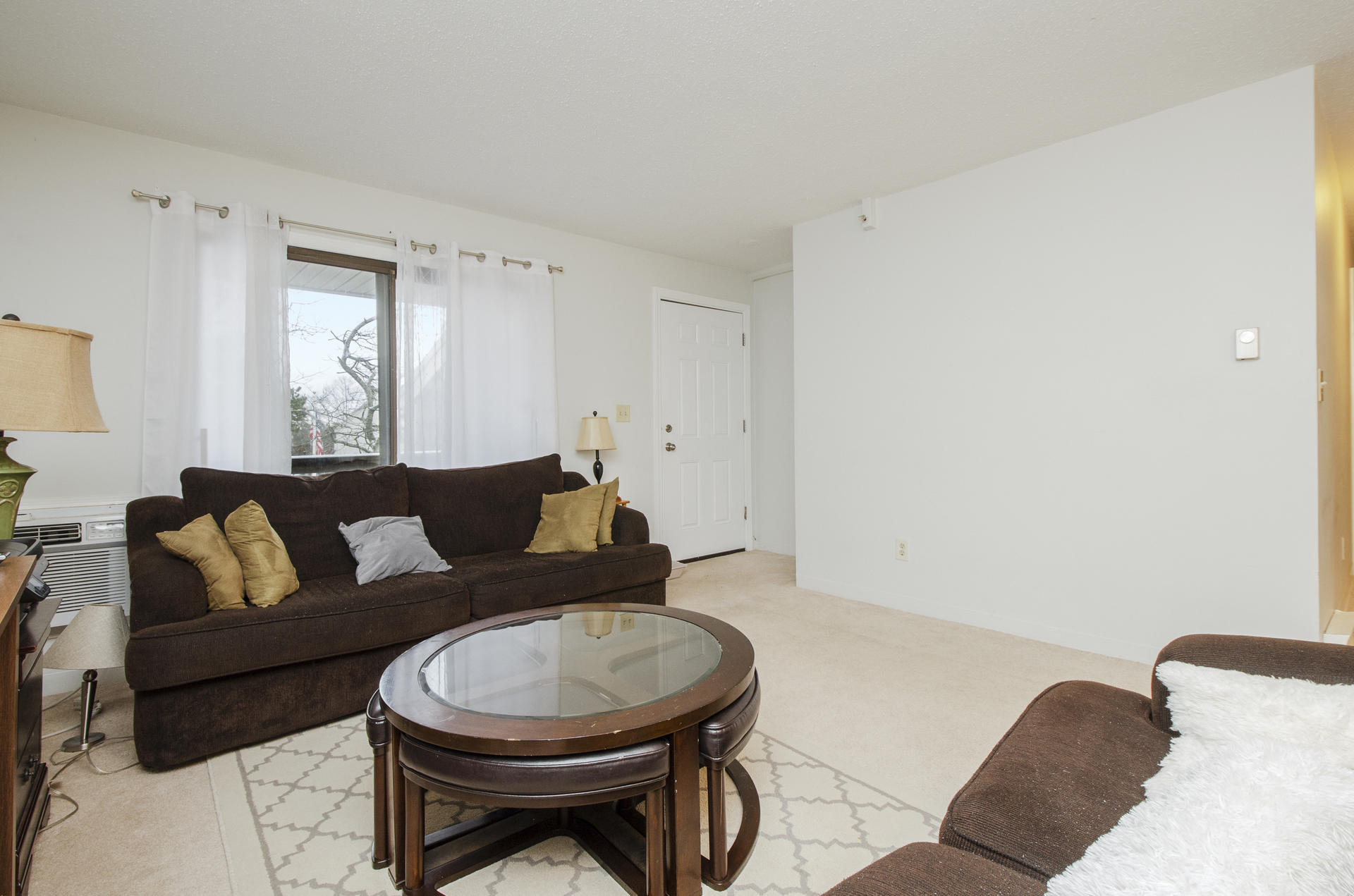 800 Bearses Way, Unit 4EC Hyannis, MA 02601 - Photo 6 of 20 a living room with furniture and a window