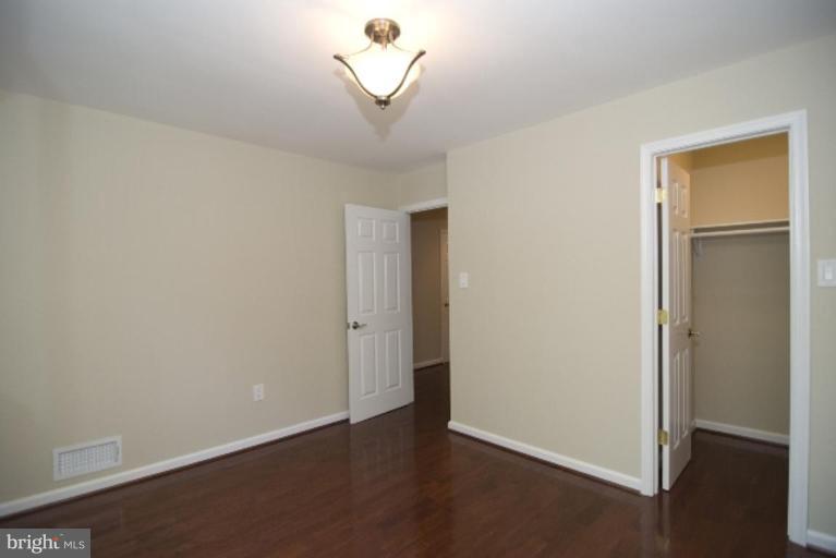 2403 Myrtle Lane Reston, VA 20191 - Photo 14 of 25 a view of an empty room with a window