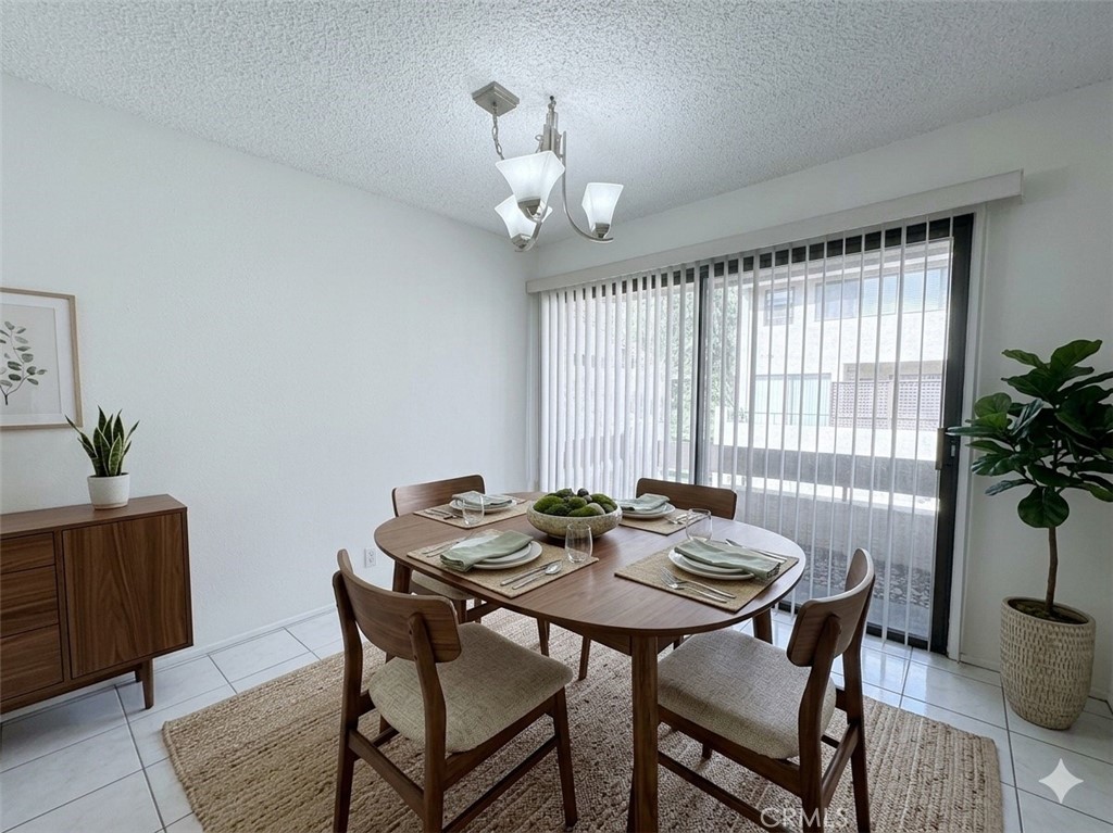 17 Rock Cliff Place Phillips Ranch, CA 91766 - Photo 14 of 38 Staged (AI) dining area