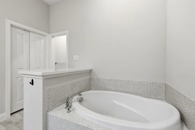 a bathroom with a bathtub