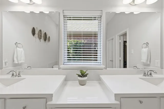 a bathroom with a sink and a bathtub