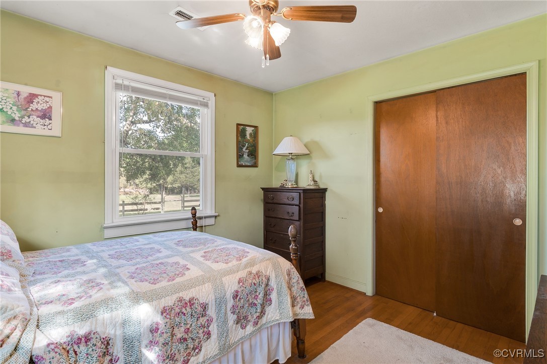 10522 Summer Hill Road Mechanicsville, VA 23116 - Photo 11 of 48 a bedroom with a bed and a window
