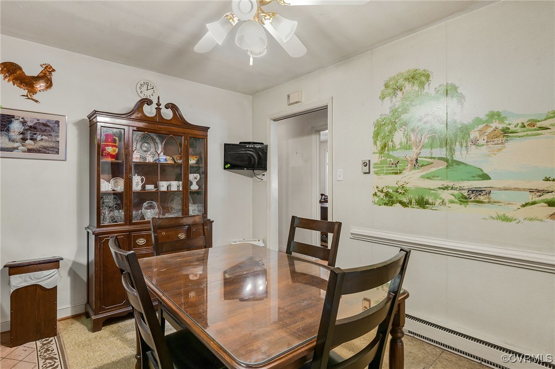 10522 Summer Hill Road Mechanicsville, VA 23116 - Photo 14 of 48 a view of a dining room with furniture and chandelier