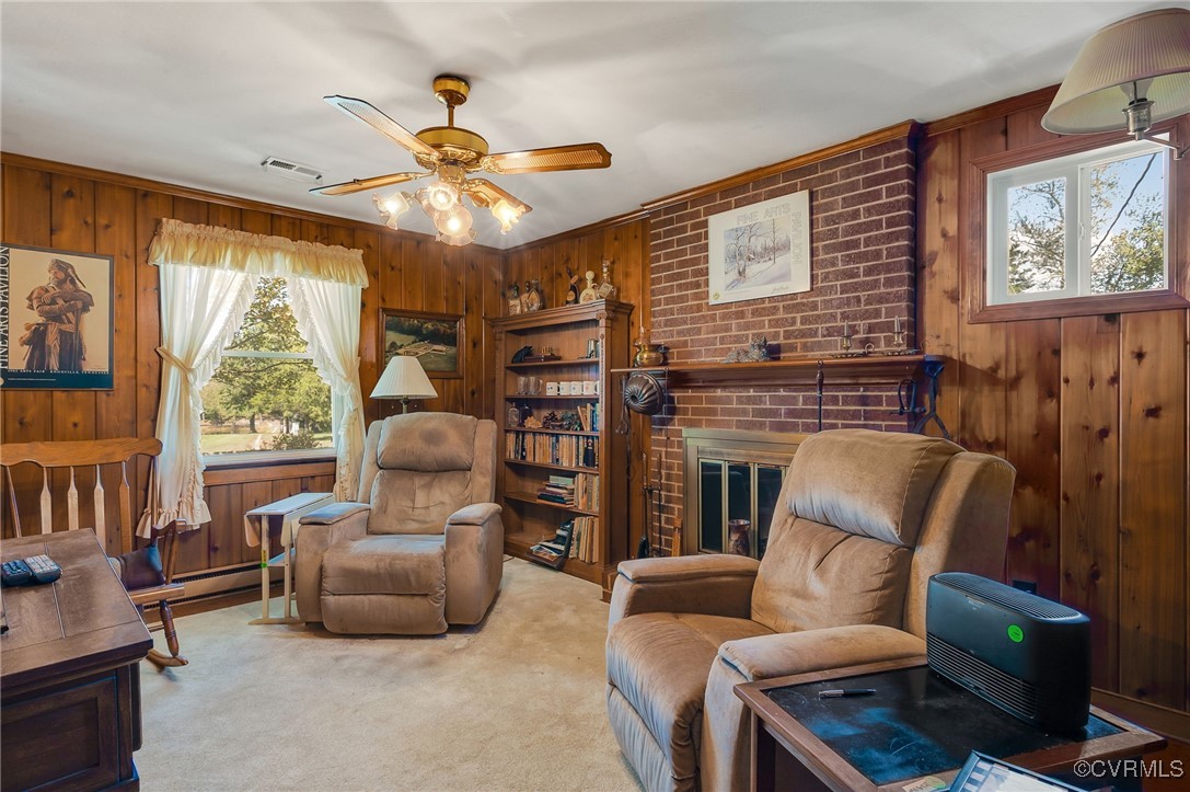 10522 Summer Hill Road Mechanicsville, VA 23116 - Photo 15 of 48 a living room with furniture a flat screen tv and a large window