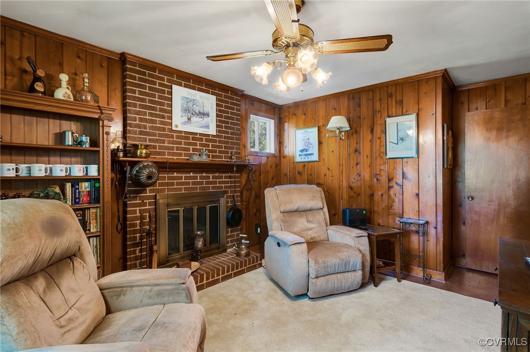 10522 Summer Hill Road Mechanicsville, VA 23116 - Photo 16 of 48 a living room with furniture and a fireplace