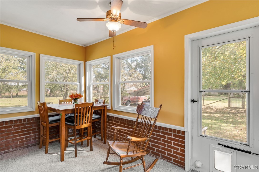 10522 Summer Hill Road Mechanicsville, VA 23116 - Photo 19 of 48 a view of a dining room with furniture window and outside view