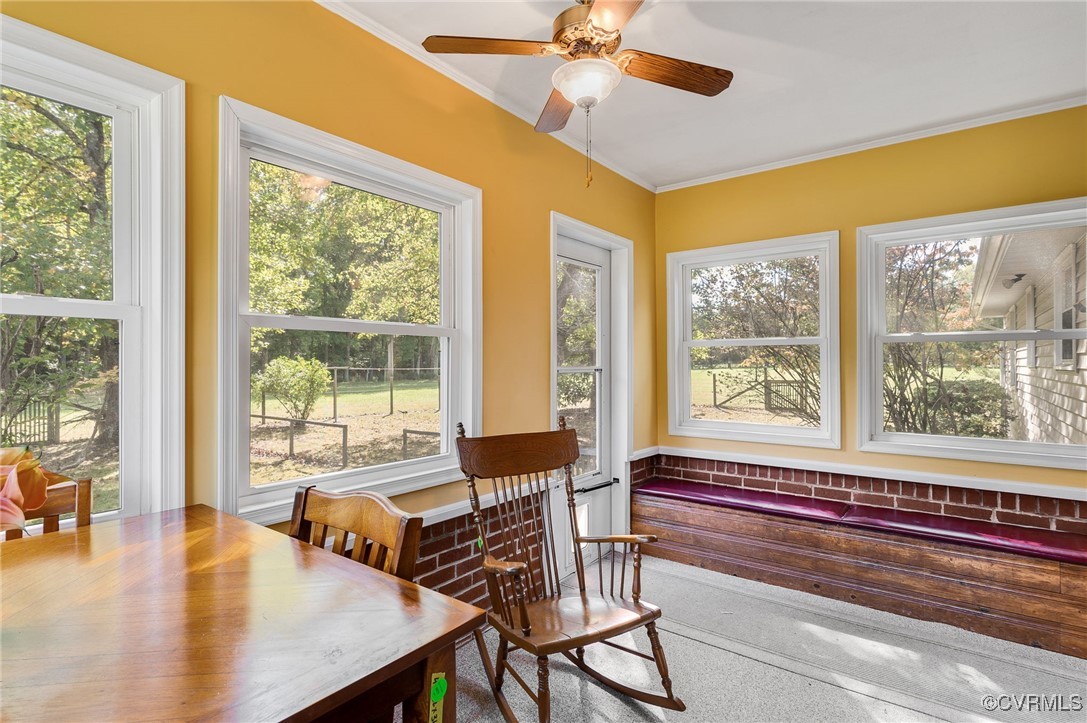 10522 Summer Hill Road Mechanicsville, VA 23116 - Photo 20 of 48 a living room with furniture and a floor to ceiling window