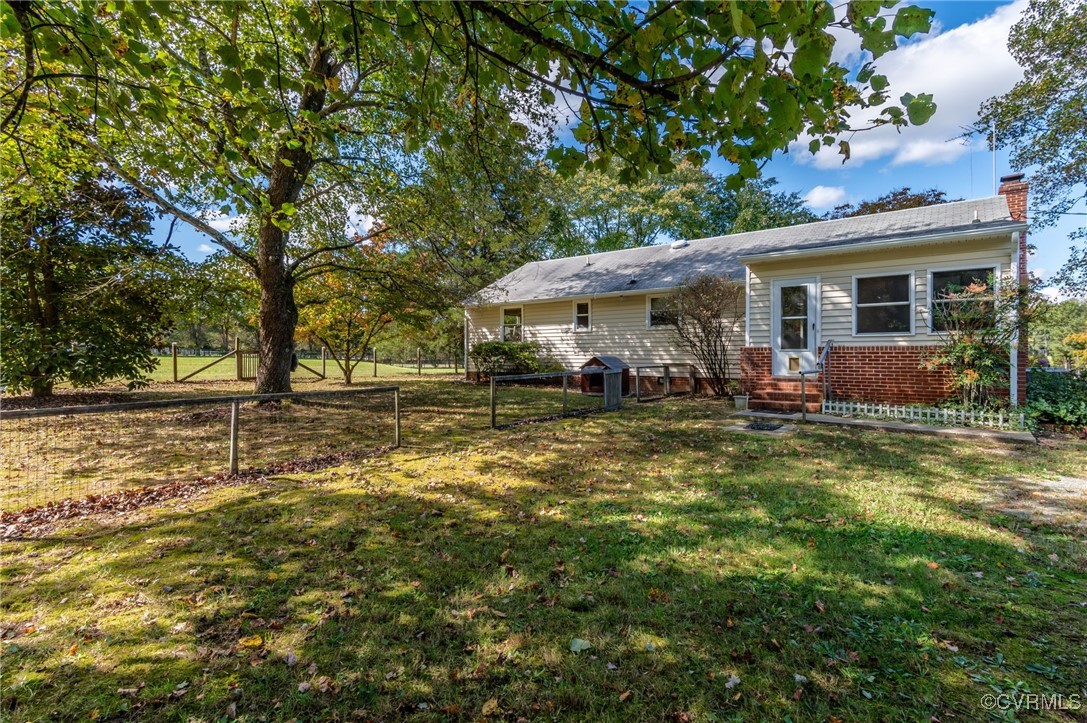 10522 Summer Hill Road Mechanicsville, VA 23116 - Photo 24 of 48 a view of a house with a yard
