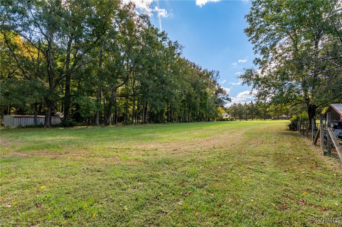 10522 Summer Hill Road Mechanicsville, VA 23116 - Photo 27 of 48 a view of a yard with a trees