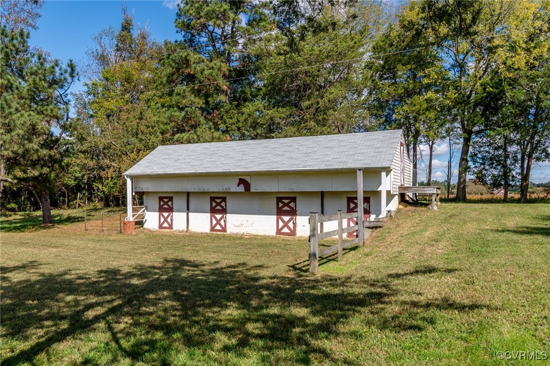 10522 Summer Hill Road Mechanicsville, VA 23116 - Photo 28 of 48 a view of a house with a yard
