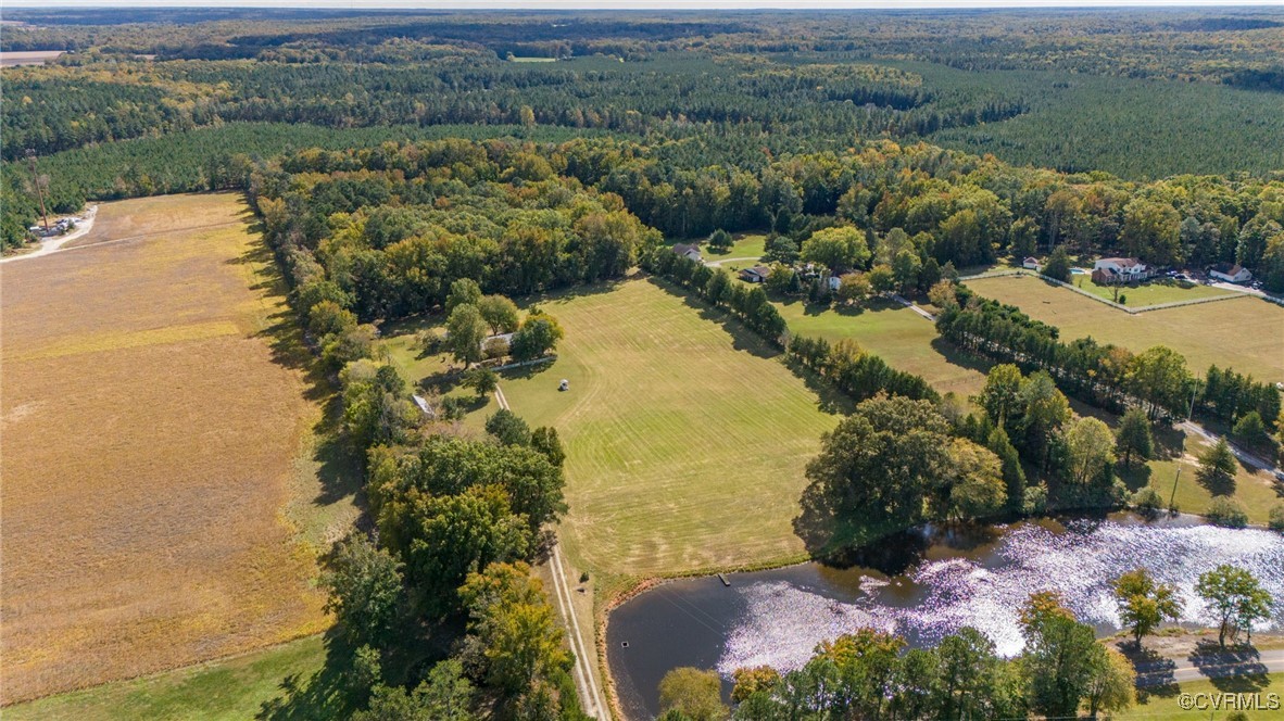 10522 Summer Hill Road Mechanicsville, VA 23116 - Photo 35 of 48 a view of a lake with a mountain in the background