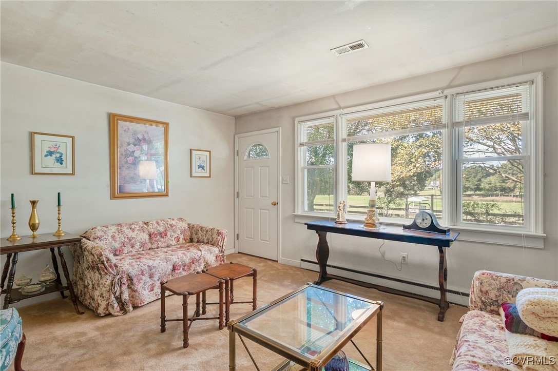 10522 Summer Hill Road Mechanicsville, VA 23116 - Photo 5 of 48 a living room with furniture and a window