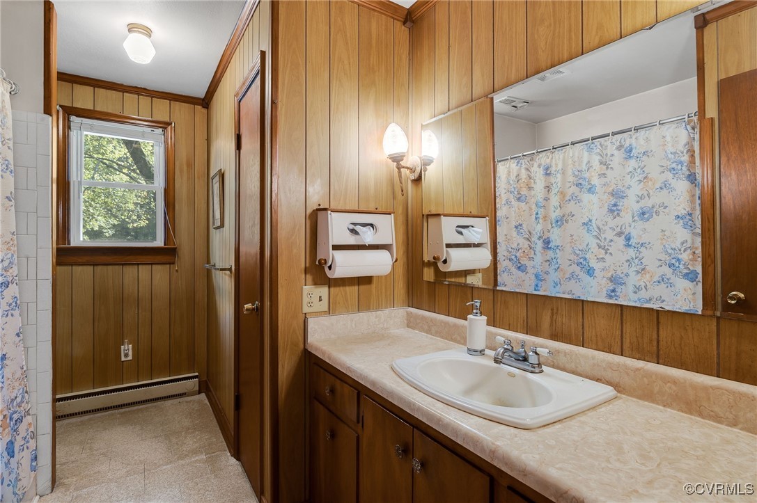10522 Summer Hill Road Mechanicsville, VA 23116 - Photo 7 of 48 a bathroom with a granite countertop sink and a mirror