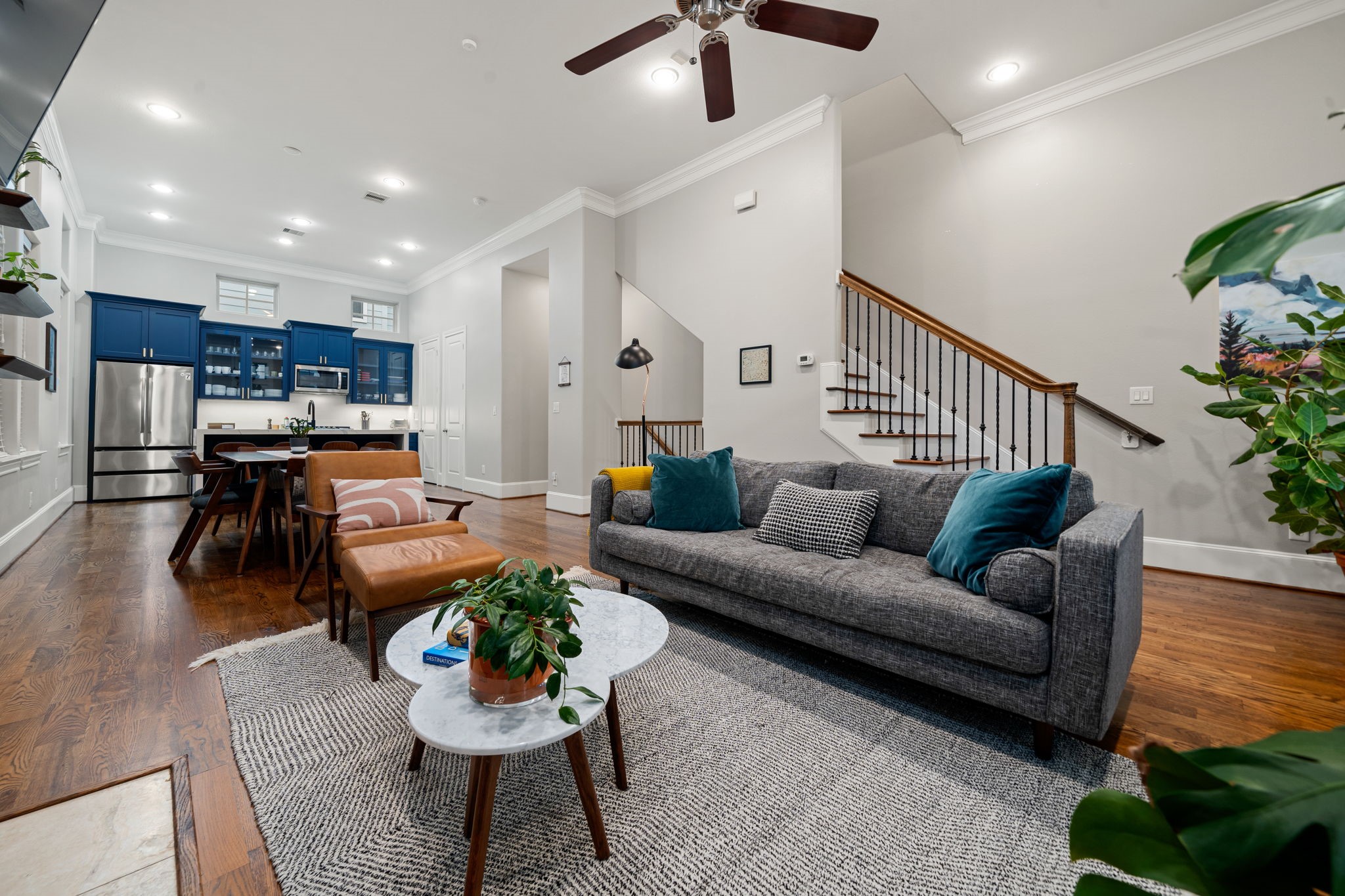 3277 Maxroy Street Houston, TX 77008 - Photo 17 of 27 a living room with furniture kitchen view and a table