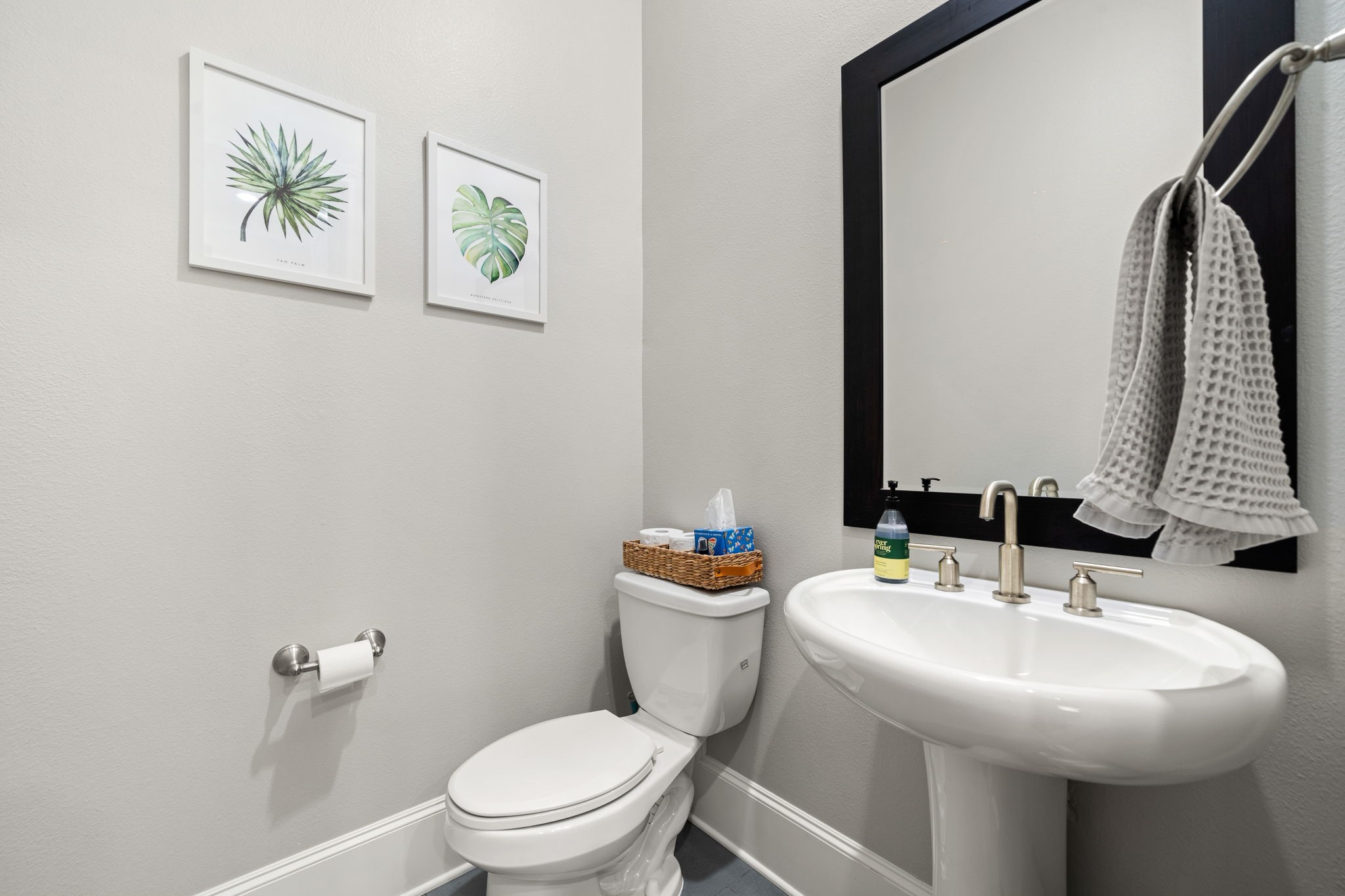 3277 Maxroy Street Houston, TX 77008 - Photo 18 of 27 a bathroom with a sink a toilet and a mirror