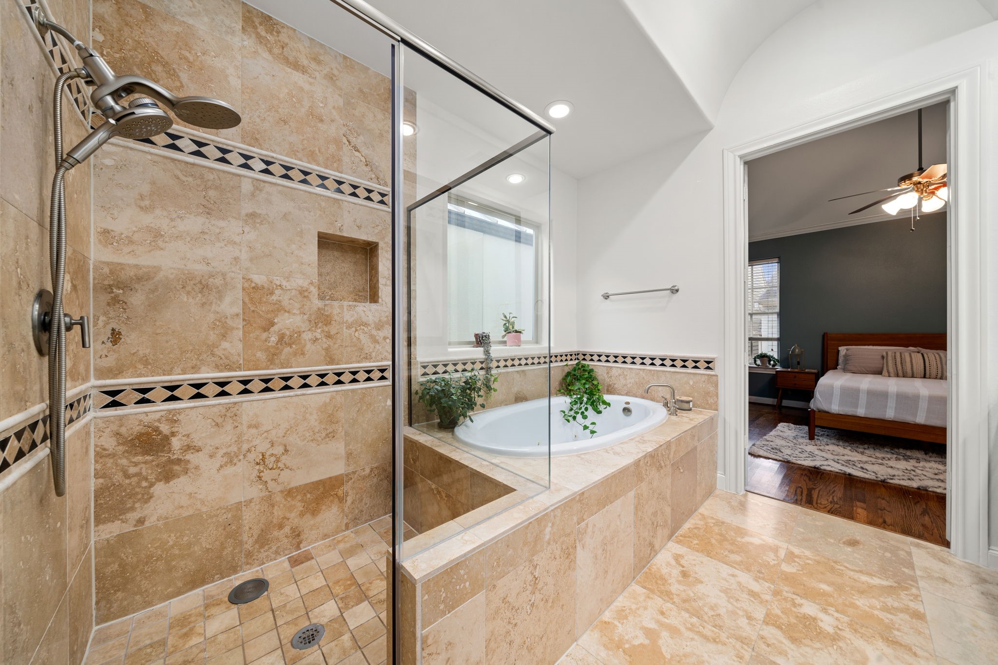 3277 Maxroy Street Houston, TX 77008 - Photo 21 of 27 a spacious bathroom with a tub and a shower