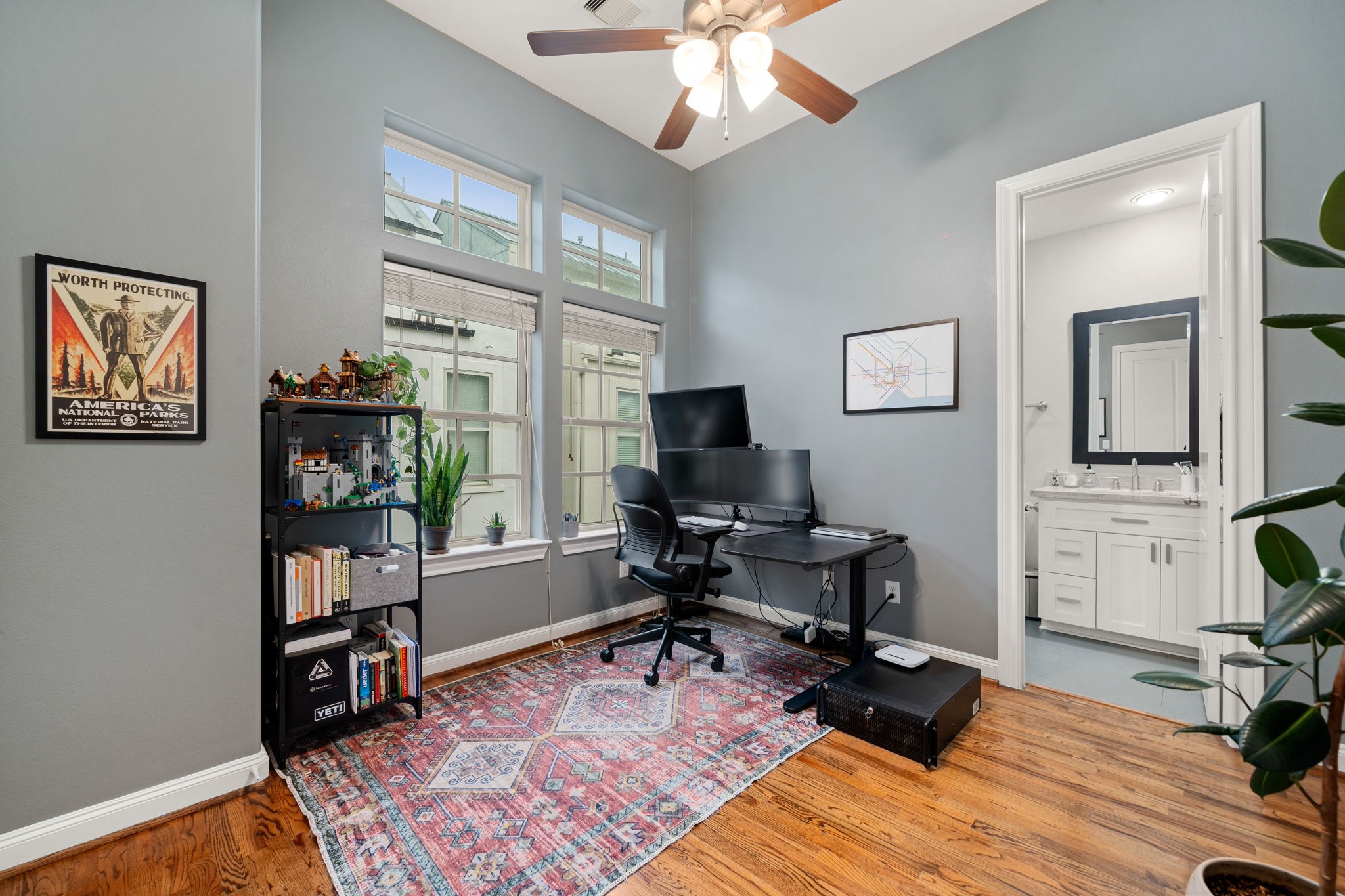 3277 Maxroy Street Houston, TX 77008 - Photo 22 of 27 a view of a workspace with furniture and a window