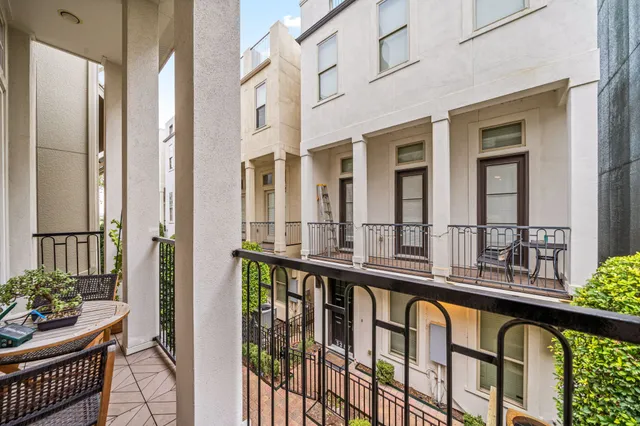 a view of an chairs and a balcony