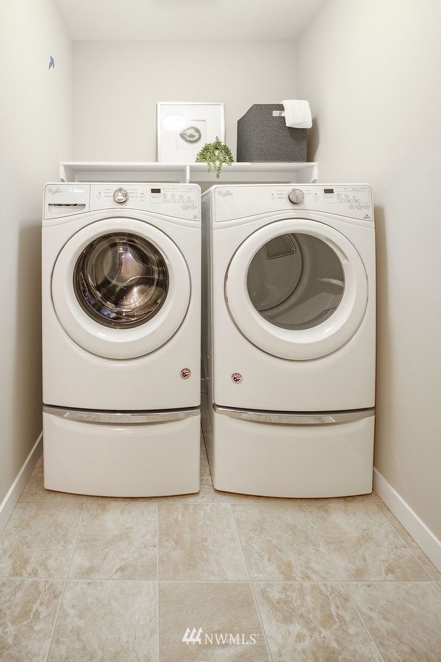 619 238th Street Southeast, Unit B Bothell, WA 98021 - Photo 19 of 20 a utility room with dryer and washer