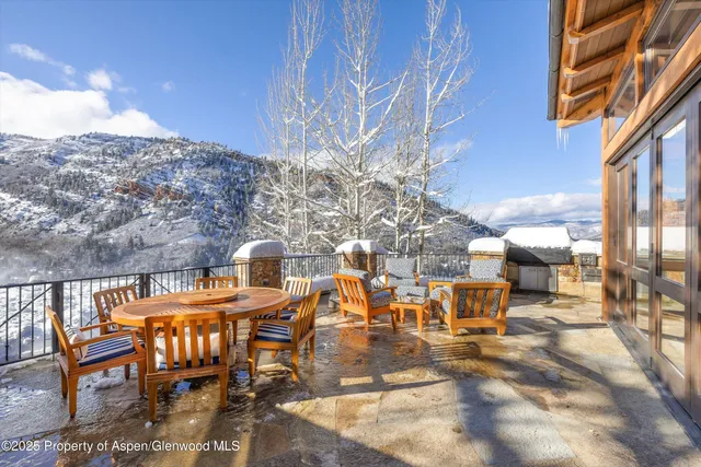 a view of a backyard of the house