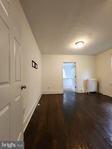 a view of a livingroom with wooden floor