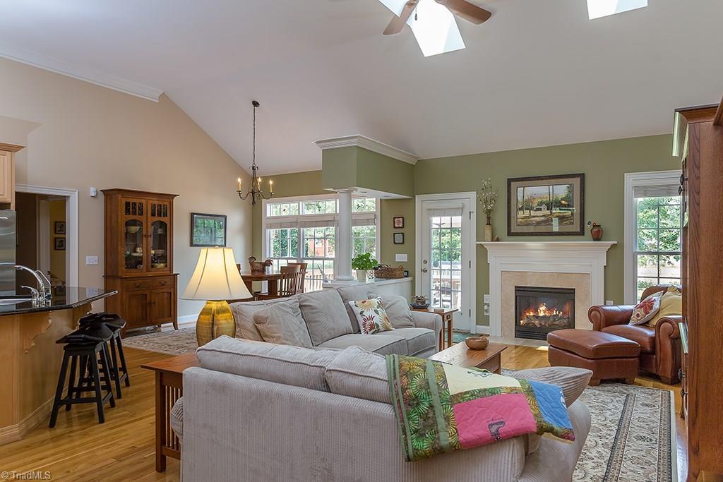 5803 Beckenham Way Oak Ridge, NC 27310 - Photo 27 of 28 High ceiling adds plenty of volume to this transitional floor plan. Skylight and window transoms add to the open airy feeling of this home.