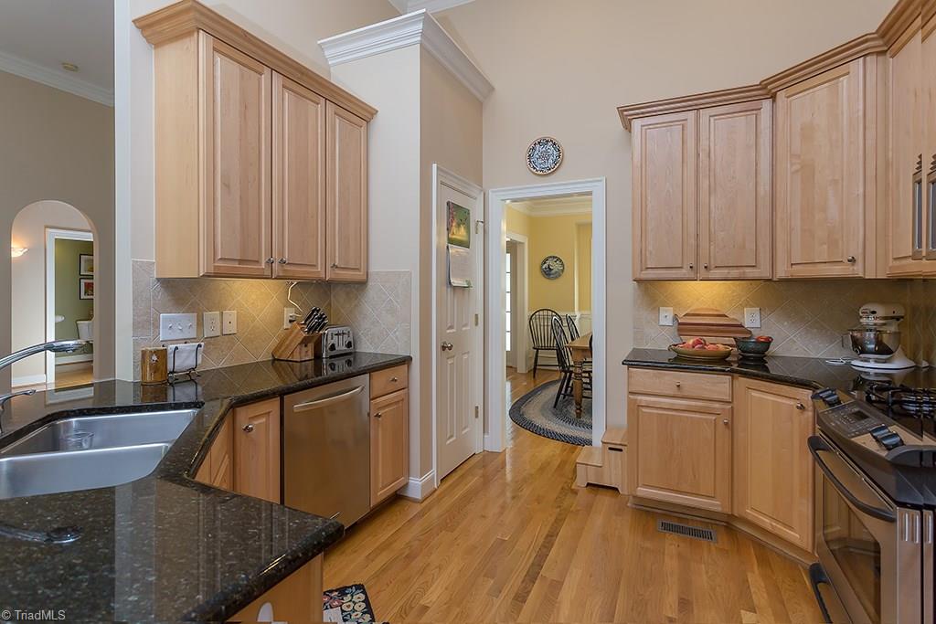 5803 Beckenham Way Oak Ridge, NC 27310 - Photo 6 of 28 The perfect kitchen triangle.