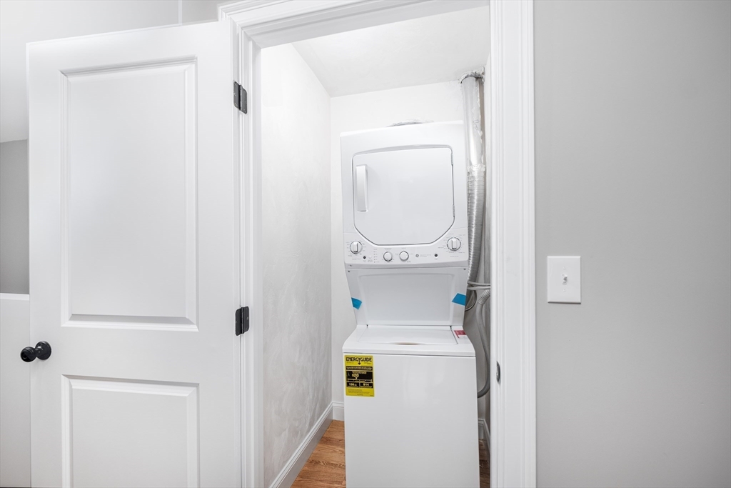 216 Vane Street, Unit 2 Revere, MA 02151 - Photo 17 of 22 a utility room with dryer and washer