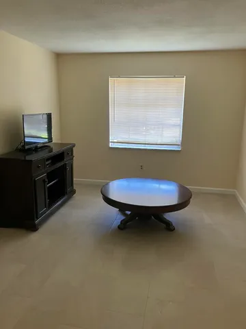 a view of a livingroom with furniture