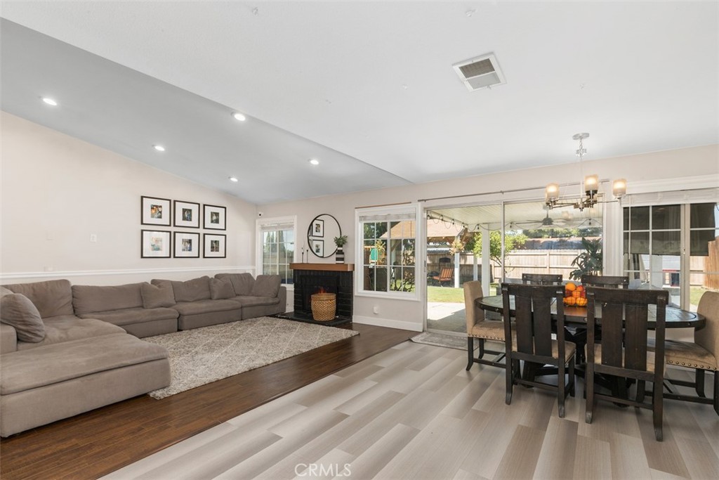 895 West Crestview Street Corona, CA 92882 - Photo 14 of 25 a living room with furniture and wooden floor