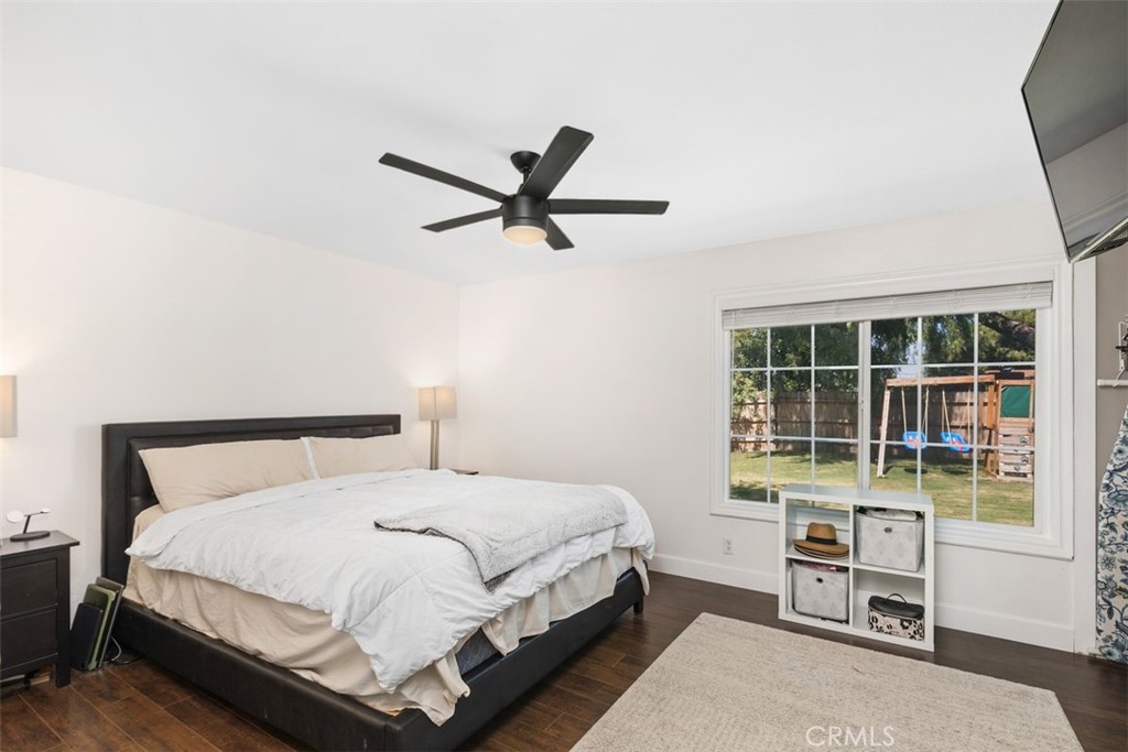 895 West Crestview Street Corona, CA 92882 - Photo 18 of 25 a bedroom with a bed and a window