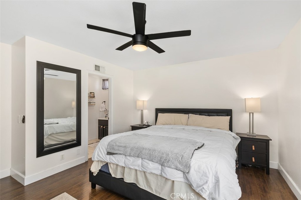 895 West Crestview Street Corona, CA 92882 - Photo 19 of 25 a bedroom with a bed and window