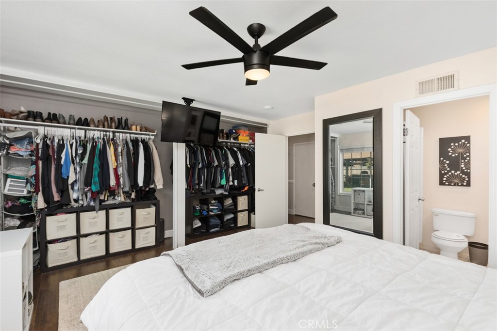 895 West Crestview Street Corona, CA 92882 - Photo 20 of 25 a bedroom with a bed a window and closet