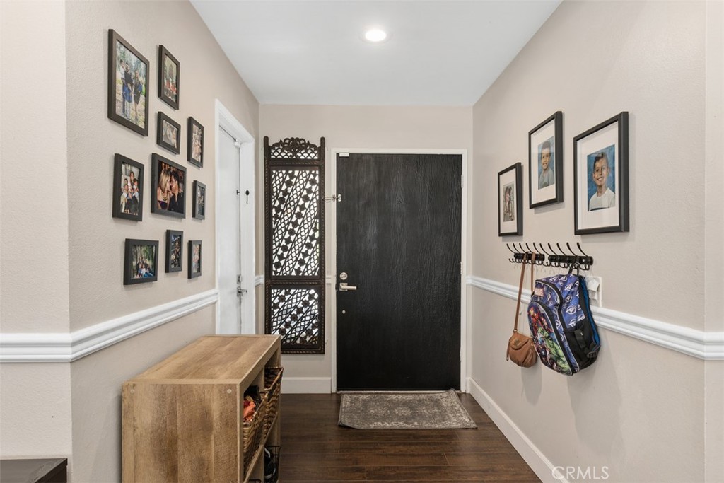 895 West Crestview Street Corona, CA 92882 - Photo 4 of 25 a view of front door with couch