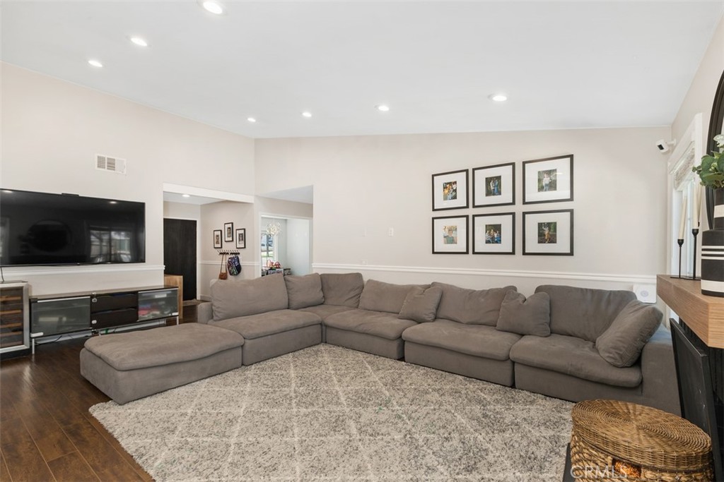 895 West Crestview Street Corona, CA 92882 - Photo 7 of 25 a living room with furniture and a flat screen tv