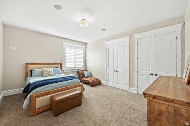 1205 North Elk Rdg Lane, Unit 202 Alpine, UT 84004 - Photo 45 of 88 Carpeted room featuring a window with white louvered shutters, ceiling-mounted light fixture, and recessed lighting