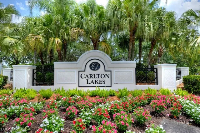 a view of swimming pool with outdoor seating and plants